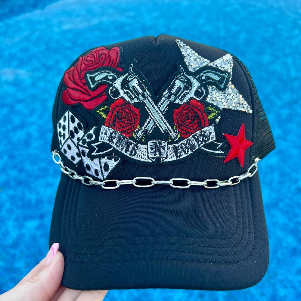 Guns and roses trucker hat with patches and chain. New/never worn.